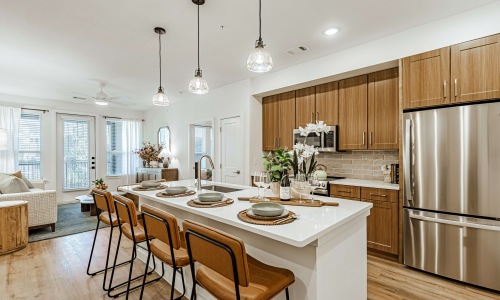 Two-bedroom apartment kitchen with island at Bevelo Larkspur